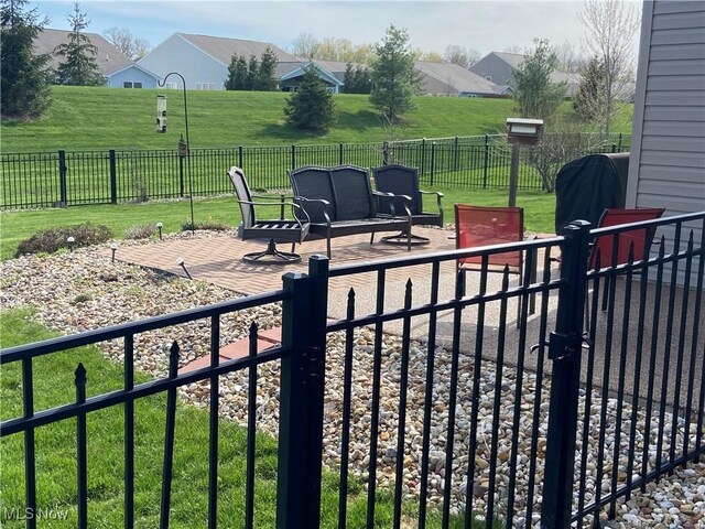 view of patio / terrace featuring fence