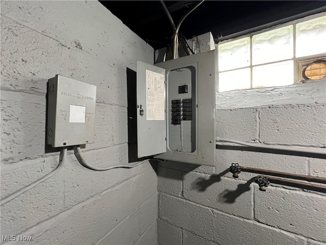 utility room featuring electric panel