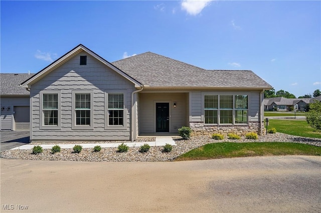 9264 Sharrott Rd Unit 1002, Poland, OH 44514 - view of front of house with stone siding and a shingled roof