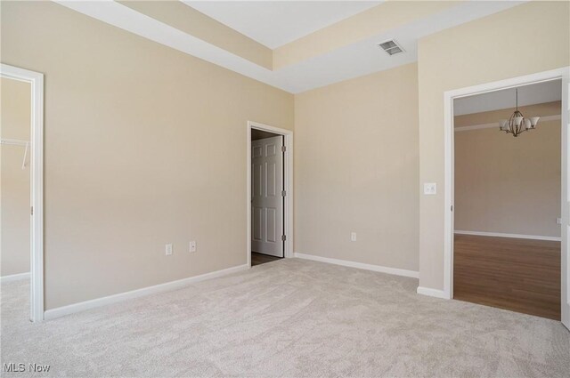 9264 Sharrott Rd Unit 1002, Poland, OH 44514 - unfurnished bedroom with a chandelier and carpet flooring