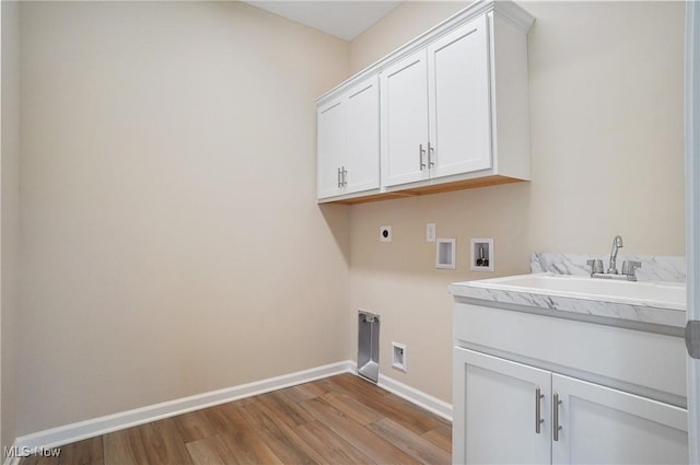 9264 Sharrott Rd Unit 1002, Poland, OH 44514 - laundry room with hookup for an electric dryer, hookup for a washing machine, cabinet space, and wood finished floors
