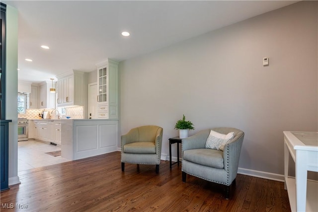 2622 Glenmont Rd NW, Canton, OH 44708 - living area with baseboards, recessed lighting, and light wood-style flooring