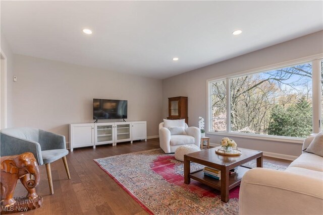 2622 Glenmont Rd NW, Canton, OH 44708 - living room with plenty of natural light, recessed lighting, and dark wood-style flooring