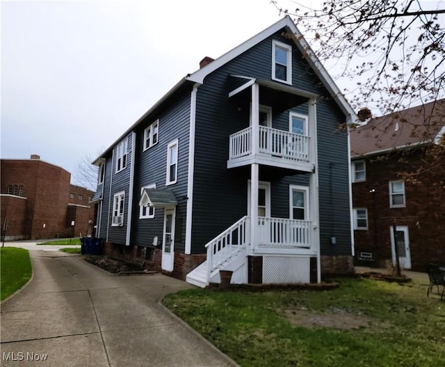 exterior space featuring a balcony
