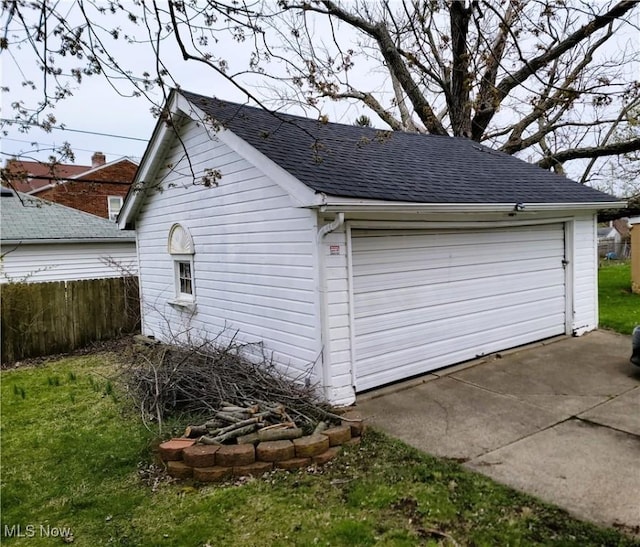 detached garage with fence