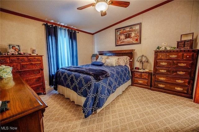 bedroom with vaulted ceiling, light carpet, a ceiling fan, and ornamental molding