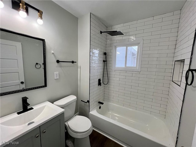 3478 E 150th St, Cleveland, OH 44120 - bathroom featuring wood finished floors, vanity,  shower combination, and toilet