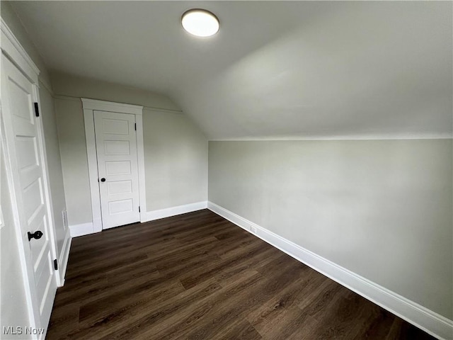 3478 E 150th St, Cleveland, OH 44120 - bonus room with lofted ceiling, baseboards, and dark wood-type flooring