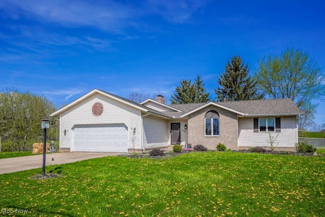 single story home with a chimney, a front lawn, driveway, an attached garage, and brick siding