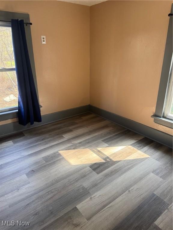 625 Allyn St, Akron, OH 44311 - empty room featuring wood finished floors and baseboards