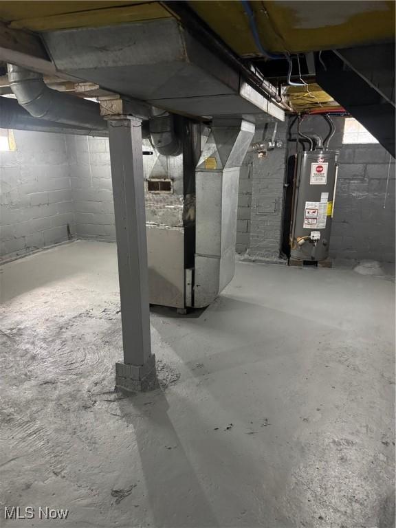 625 Allyn St, Akron, OH 44311 - unfinished basement with gas water heater