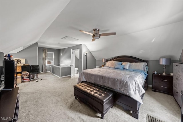 bedroom featuring baseboards, vaulted ceiling, a ceiling fan, and light colored carpet
