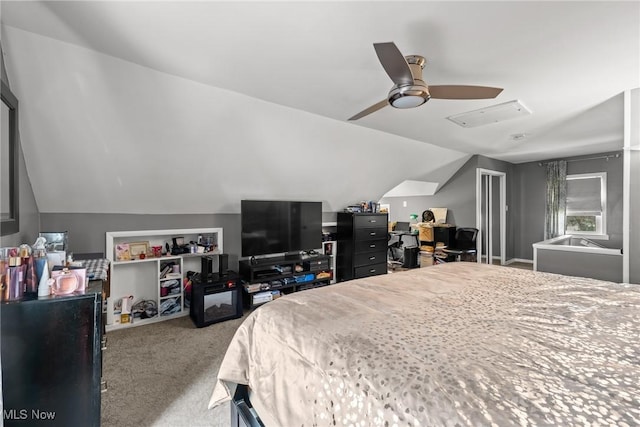 carpeted bedroom with lofted ceiling and a ceiling fan