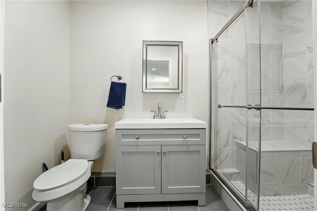 3270 S Canfield Niles Rd, Canfield, OH 44406 - full bath with toilet, vanity, tile patterned floors, and a stall shower