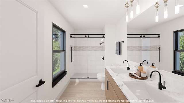 1734 Front St Unit 34, Cuyahoga Falls, OH 44221 - full bathroom featuring double vanity, toilet, a shower stall, and a sink