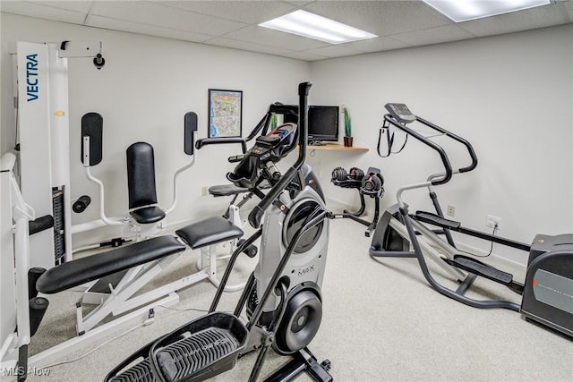 gym featuring a paneled ceiling