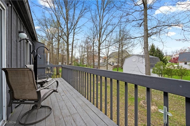 wooden deck with a residential view