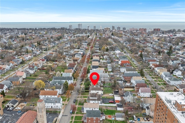 aerial view featuring a water view and a residential view
