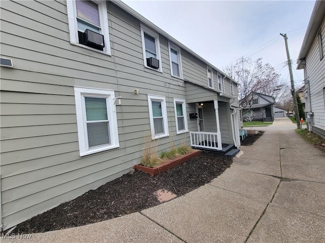 view of home's exterior with cooling unit