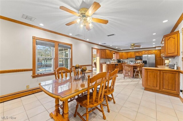 148 N Kimberly Ave N, Youngstown, OH 44515 - dining space with ceiling fan, recessed lighting, crown molding, a baseboard heating unit, and light tile patterned floors