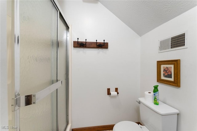 148 N Kimberly Ave N, Youngstown, OH 44515 - full bathroom with vaulted ceiling, a stall shower, and a textured ceiling