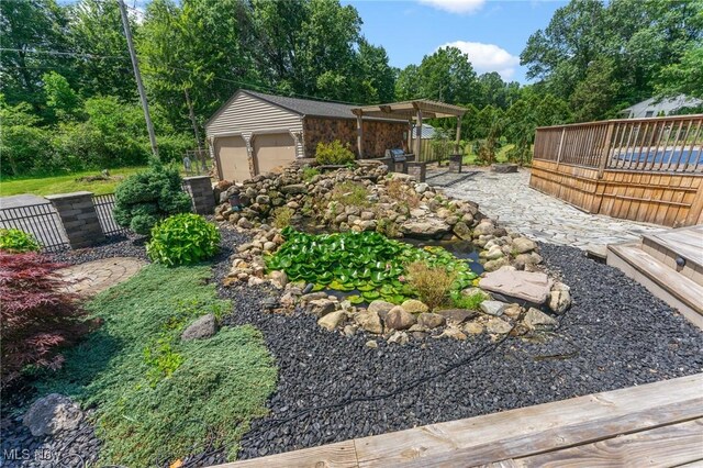 148 N Kimberly Ave N, Youngstown, OH 44515 - view of yard featuring a deck and an outbuilding