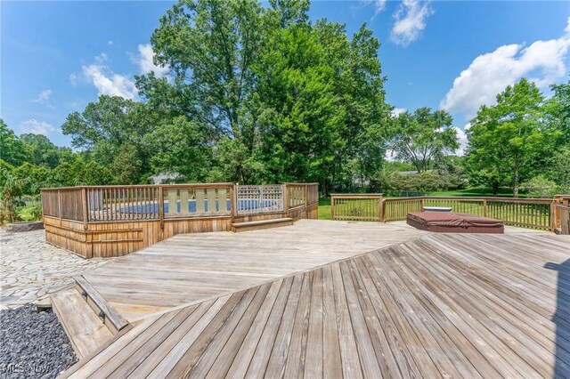 148 N Kimberly Ave N, Youngstown, OH 44515 - deck featuring view of wooded area