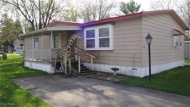 46 Navajo, Creston, OH 44217 - manufactured / mobile home with a front lawn