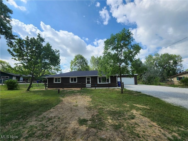 1490 Evergreen Dr, Streetsboro, OH 44241 - ranch-style house with a garage, driveway, and a front yard