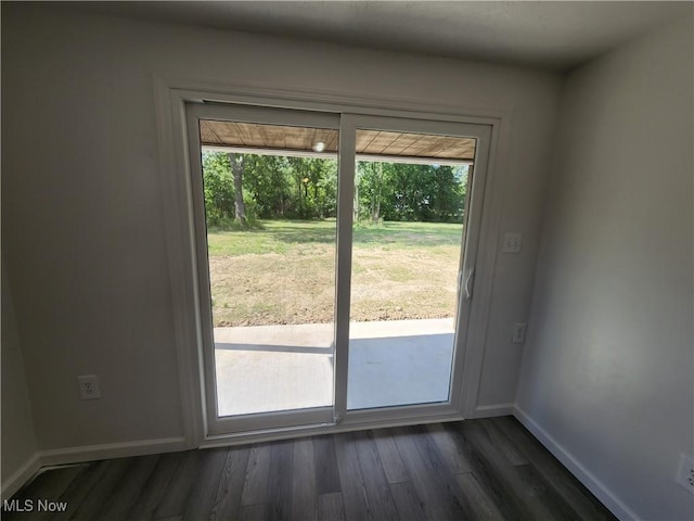 1490 Evergreen Dr, Streetsboro, OH 44241 - doorway to outside with a wealth of natural light, dark wood-style floors, and baseboards