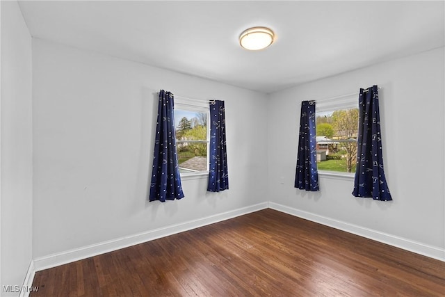120 Hillcrest Dr, Wellsburg, WV 26070 - spare room with baseboards and dark wood-type flooring