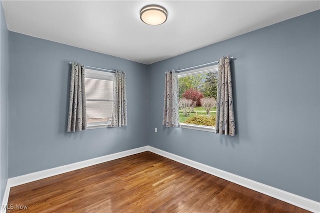 120 Hillcrest Dr, Wellsburg, WV 26070 - spare room featuring baseboards and wood finished floors