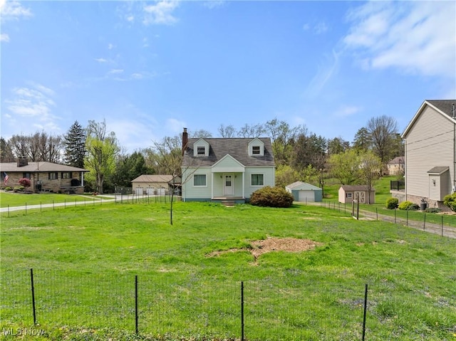 120 Hillcrest Dr, Wellsburg, WV 26070 - view of front of home featuring a storage shed, a chimney, a fenced backyard, an outdoor structure, and a front yard