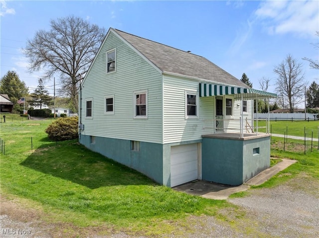 120 Hillcrest Dr, Wellsburg, WV 26070 - view of property exterior with fence, a shingled roof, driveway, a lawn, and a garage