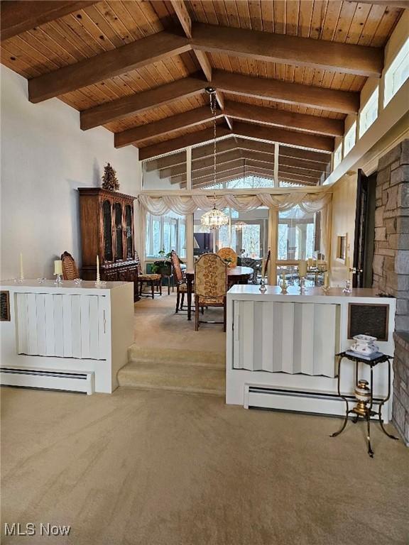 living room featuring a baseboard radiator, wood ceiling, light colored carpet, and an inviting chandelier