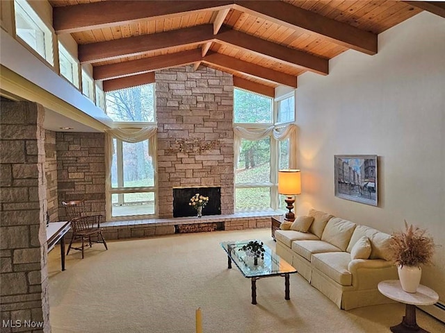 living room with beamed ceiling, high vaulted ceiling, carpet, and wood ceiling