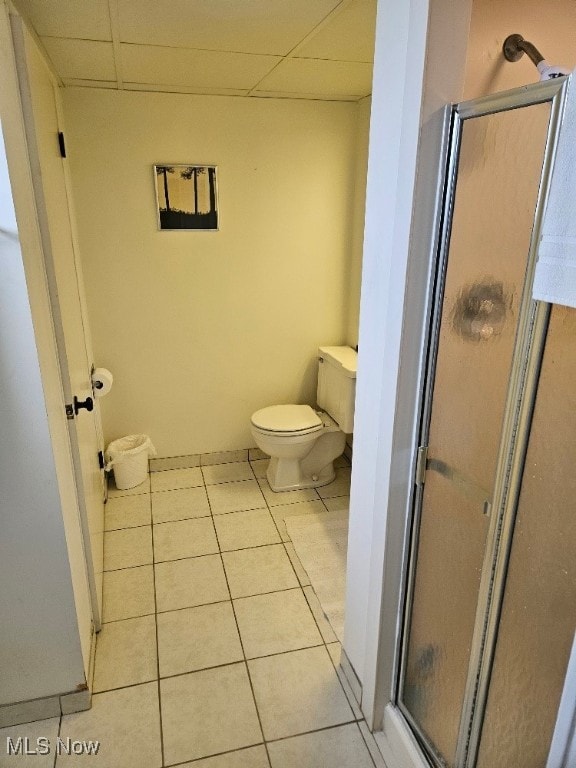 805 Lynnwood Dr, Minerva, OH 44657 - full bathroom with a paneled ceiling, toilet, a stall shower, and tile patterned flooring