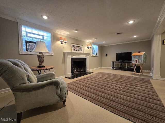 living room with recessed lighting, a high end fireplace, a textured ceiling, and ornamental molding