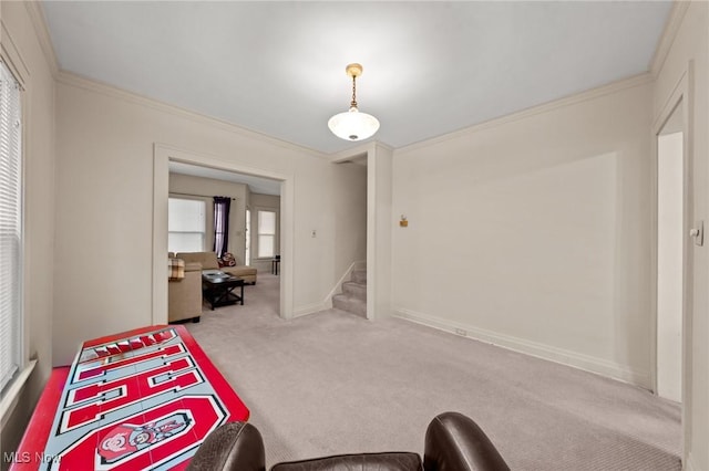 bedroom featuring carpet floors, baseboards, and ornamental molding