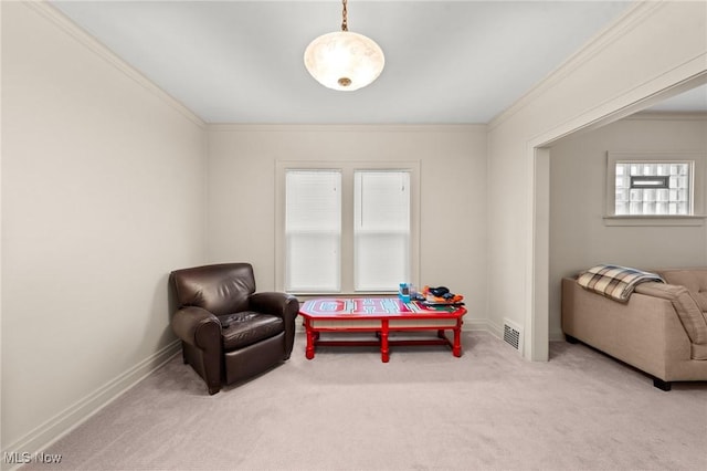 living area featuring baseboards, crown molding, carpet flooring, and visible vents
