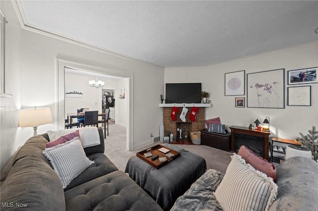 carpeted living room featuring a chandelier, a fireplace, crown molding, and baseboards