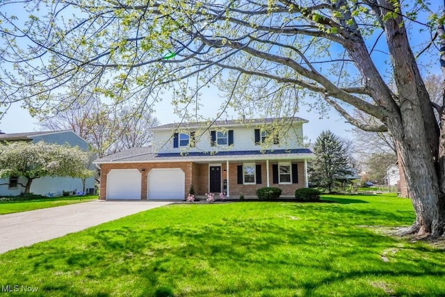 traditional home featuring a front lawn, driveway, a porch, brick siding, and a garage