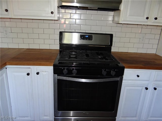 22742 US Route 30, Minerva, OH 44657 - kitchen featuring stainless steel range with gas stovetop, wood counters, wall chimney range hood, and tasteful backsplash