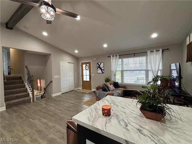 53206 Poplar Dr, Bridgeport, OH 43912 - living room with recessed lighting, wood finished floors, ceiling fan, stairs, and baseboards