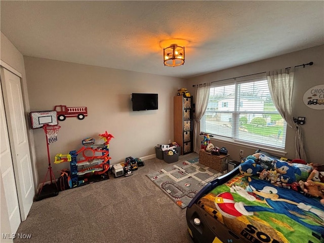 53206 Poplar Dr, Bridgeport, OH 43912 - carpeted bedroom featuring a closet and baseboards
