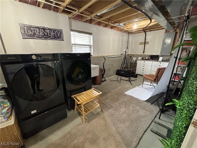 53206 Poplar Dr, Bridgeport, OH 43912 - laundry area featuring washing machine and dryer and electric panel