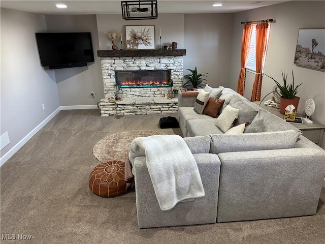 53206 Poplar Dr, Bridgeport, OH 43912 - carpeted living room featuring baseboards, a fireplace, and recessed lighting