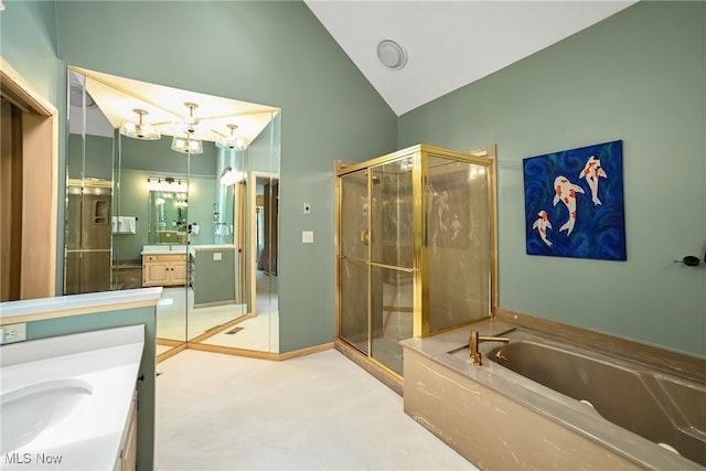 full bath featuring vanity, a garden tub, lofted ceiling, and a shower stall