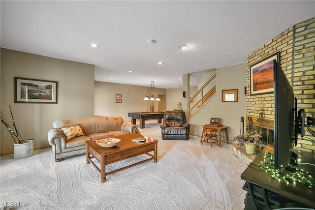 carpeted living area with billiards, a fireplace, recessed lighting, and stairs