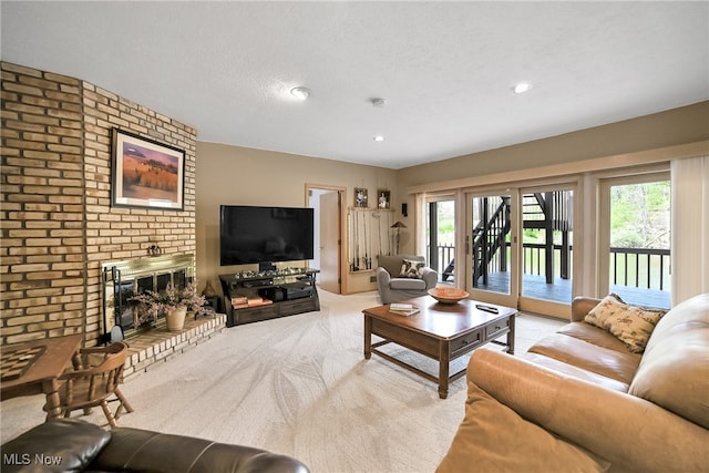 4845 Timber Creek Dr, Medina, OH 44256 - living room with carpet flooring, a brick fireplace, brick wall, and recessed lighting